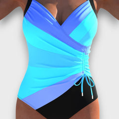 Nerine – Schwarzer Badeanzug mit raffiniertem Twist in Blau