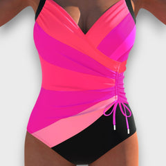 Nerine – Schwarzer Badeanzug mit raffiniertem Twist in Rosa