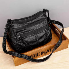 Elegante Damenhandtasche aus funktionalem, weichem Material in Schwarz