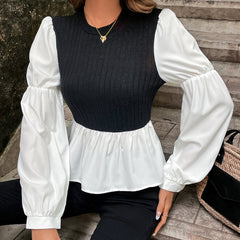 Damen Bluse mit voluminösen Puffärmeln und strukturiertem Oberteil in Schwarz