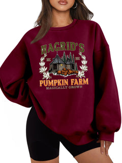 Damen Sweatshirt mit gemütlichem Rundhalsausschnitt und herbstlichem Kürbis-Motiv in Weinrot