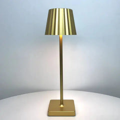 Illumine - Tischlampe in Gold