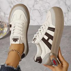Cherise - und bequeme Sneakers in Braun