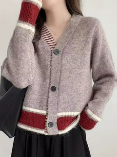 Damen Langarm Strickjacke mit V-Ausschnitt und Drei-Knopf-Leiste in melierter Oberfläche in Mauve