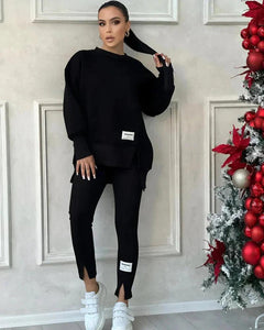 Damen Set mit Rundhals-Pullover und Leggings mit Kängurutasche in Schwarz