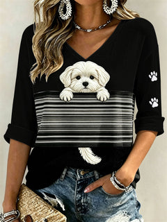 Damen-T-Shirt mit verstecktem Malteser-Hund und Pfotenabdrucken, Color-Block-Print, mittellange Ärmel und V-Ausschnitt in Schwarz