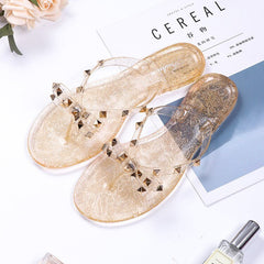 Nikki® | Flip-Flops-Sandalen mit Schleife und Nieten in Gold